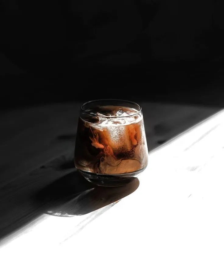 Modern glass full of ice coffee